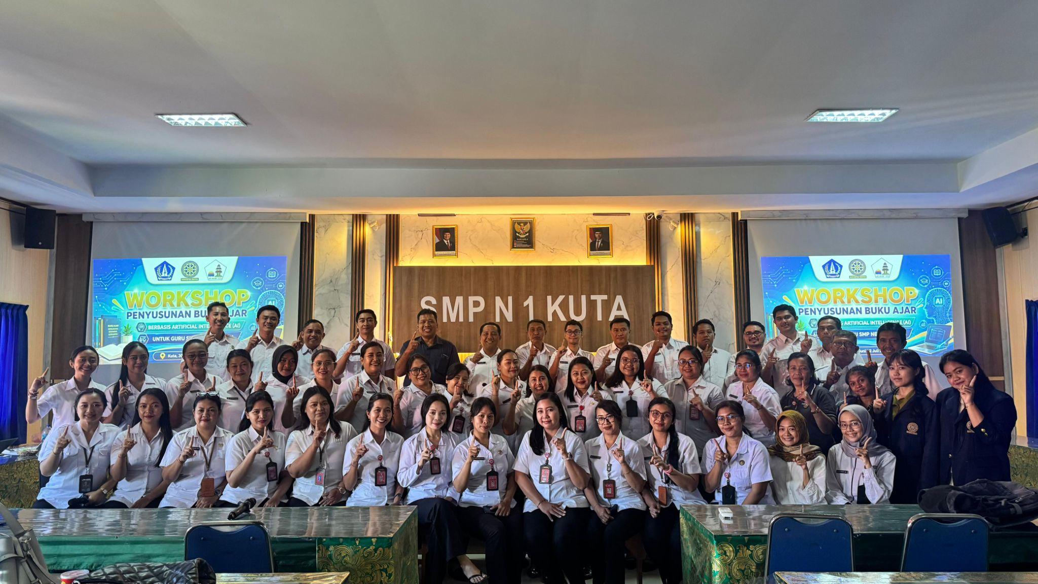 Realising an Impactful Campus, Unud Holds AI-Based Textbook Writing Workshop  to Enhance Teacher Competency at SMPN 1 Kuta